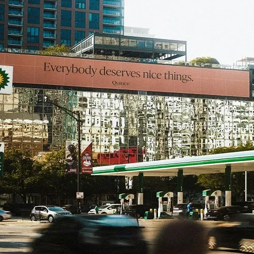 Outdoor digital ads on an urban digital billboard highlighting advertising costs